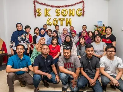 Lawyer reviewing case files at S.K. Song JB office